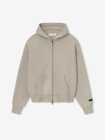 เสื้อฮู้ดดี้ซิปขนแกะคลาสสิก Essentials จาก Fear of God สี Heather Stone (SS25)